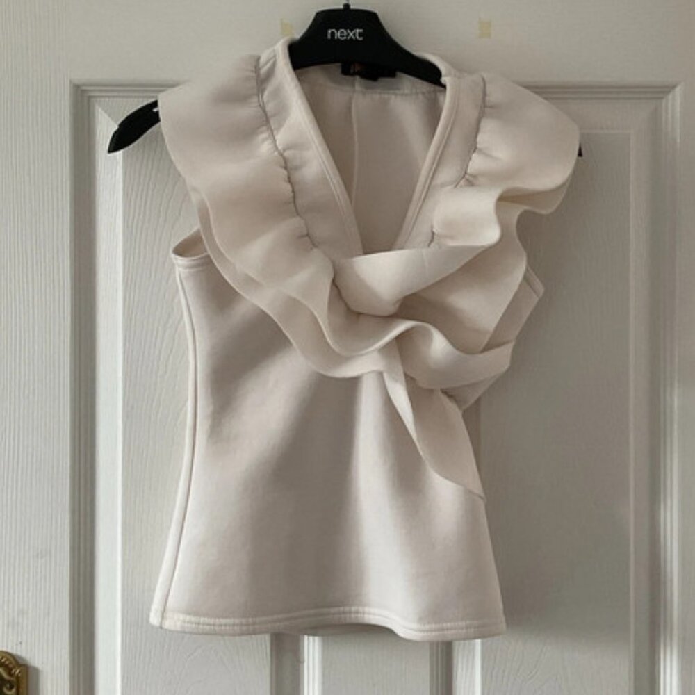 Cream ruffle top